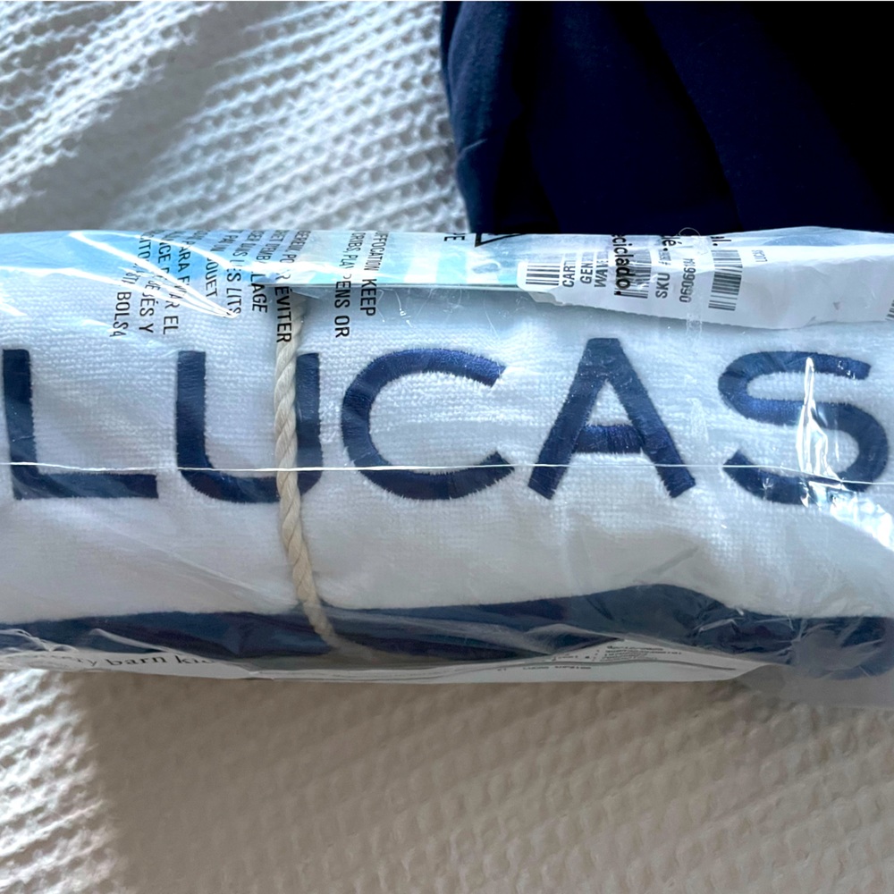 Pottery barn, kids beach towel personalized.
LUCAS